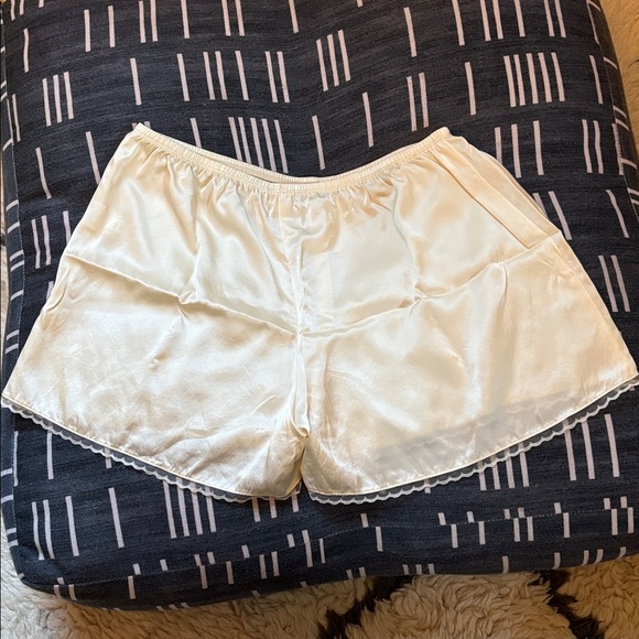 DONNI. Silk Tap Shorts in Light Yellow - Picture 9 of 17